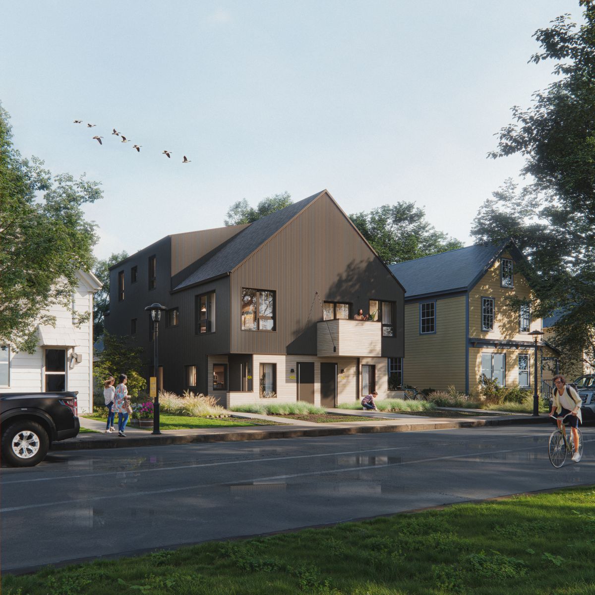 A 3D rendering of a  fourplex with a dark metal exterior and a steep gabled roof, blends into the neighbourhood. 